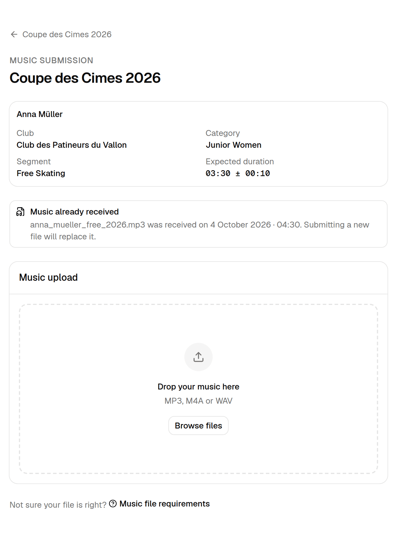 The submission page with a notice: Music already received — anna_mueller_free_2026.mp3 was received; submitting a new file will replace it.
